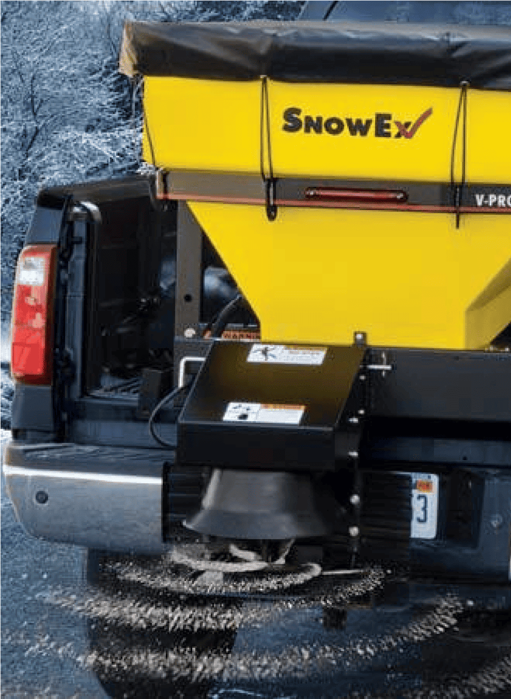 A combination of salt and sand applied to icy lots and roadways